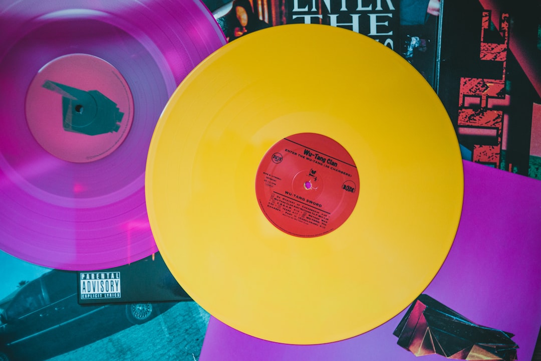 2026 indie music release calendar with a desk calendar, vinyl sleeves, sticky notes, and streaming icons