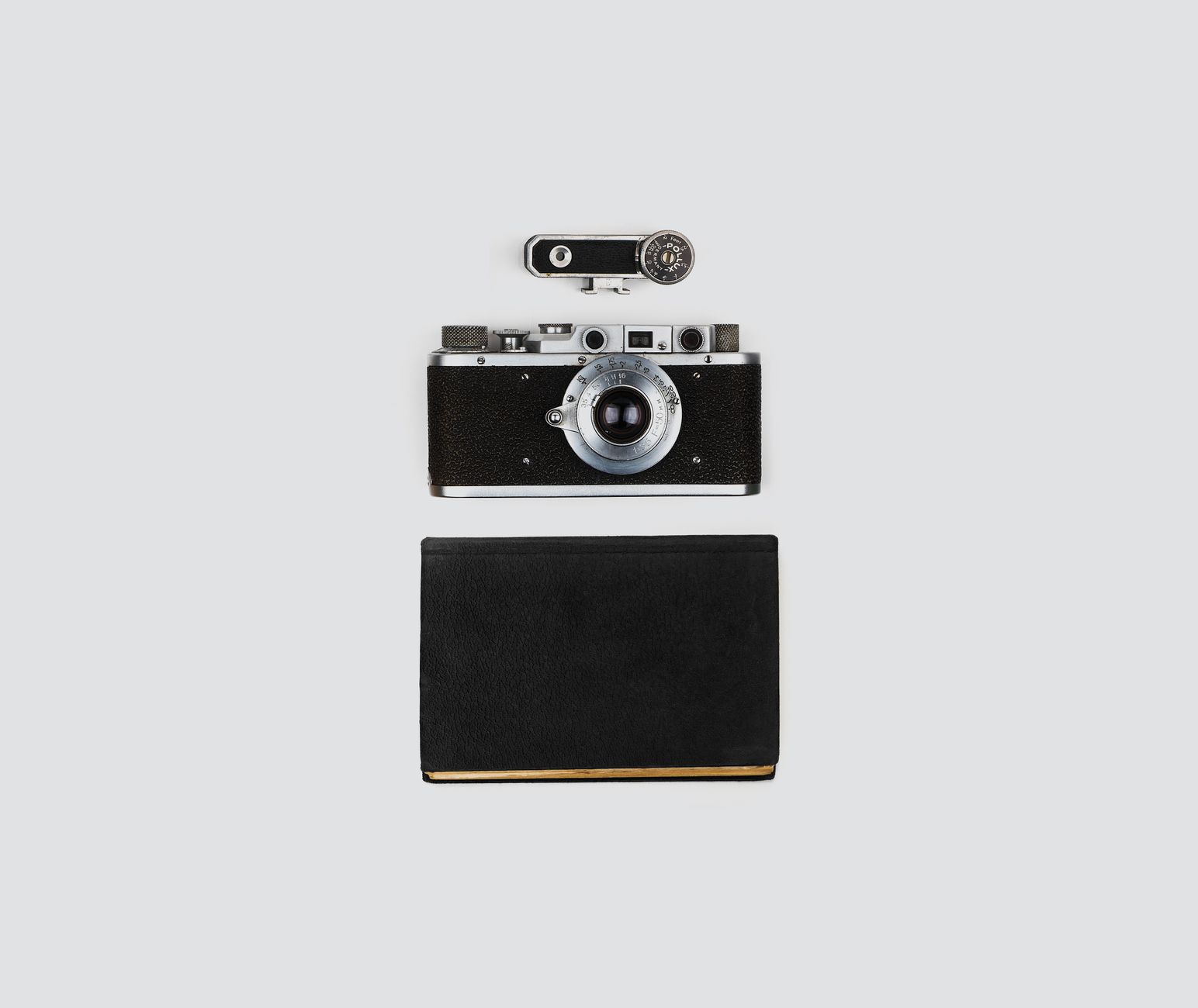 photography methodology tips cover with camera, notebook, and contact sheet