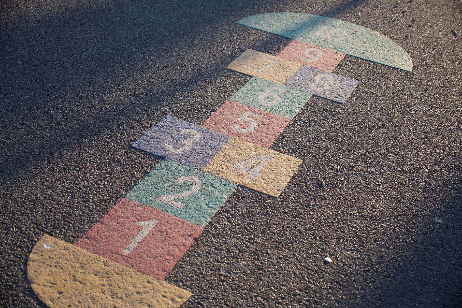 street art play cover illustration with chalk drawings and hopscotch